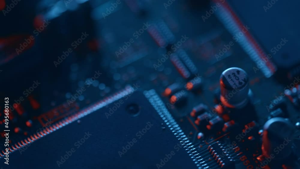 Integrated circuit board with processor close up. Electronic chip component on the blue printed pcb. Concept of computer hardware and digital computing of big data Integrated circuit board with processor close up. Electronic chip component on the blue printed pcb. Concept of computer hardware and digital computing of big data