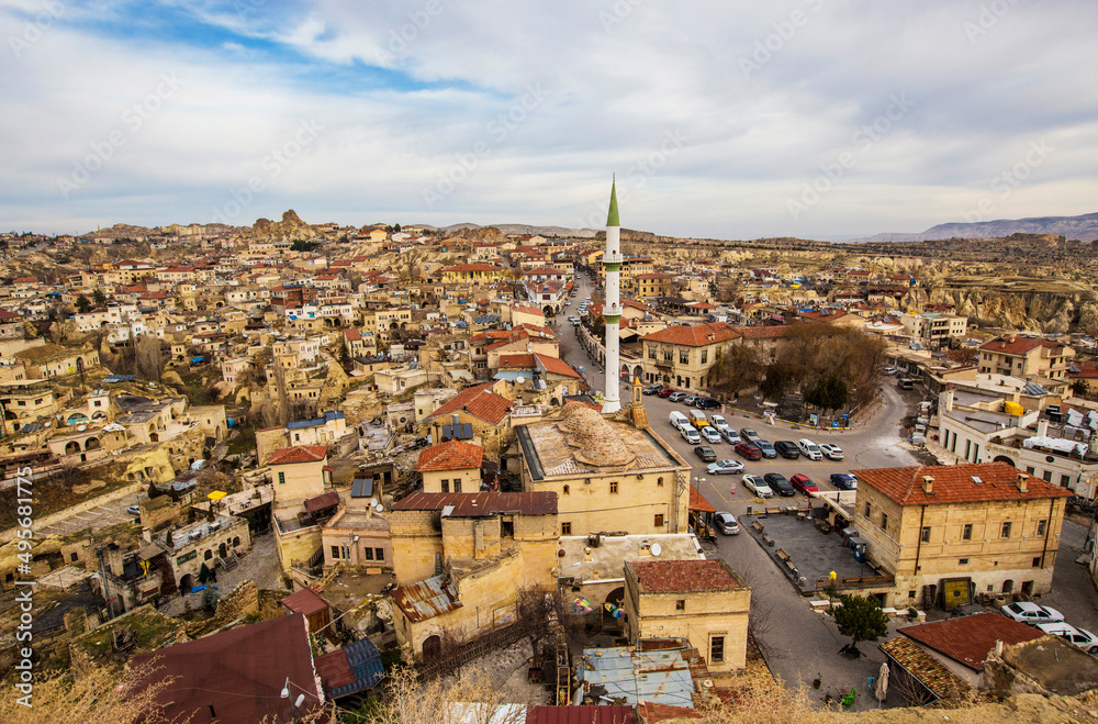 Aerial view of  Ortahisar town in Cappadocia, Turkey. Old town and mosque minaret, Anatolia, Turkey