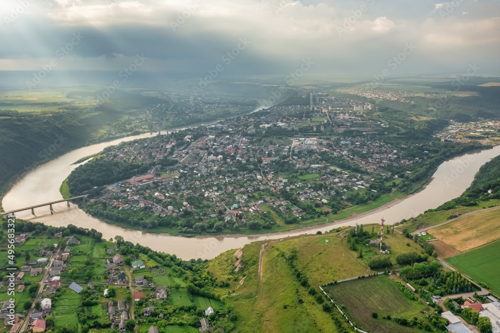 The Dniester River and the city of Zalishchyky, aerial view, a beautiful landscape of the city surrounded by a river in the form of a horseshoe. Ukraine, travel