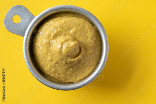 Spicy Brown Mustard in a Measuring Cup