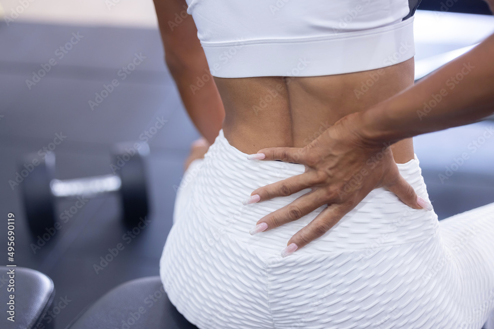 Woman Suffer From Backache After Weight Lifting