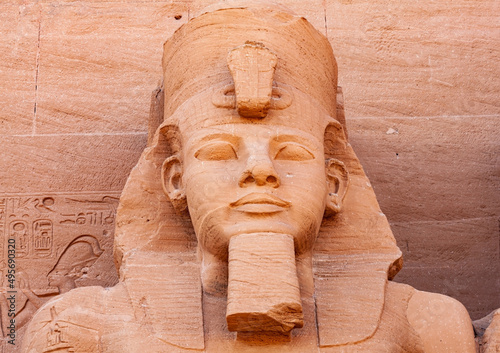 Statue of Pharaoh Ramses II in front of The Great Temple of Ramses II in the village of Abu Simbel.