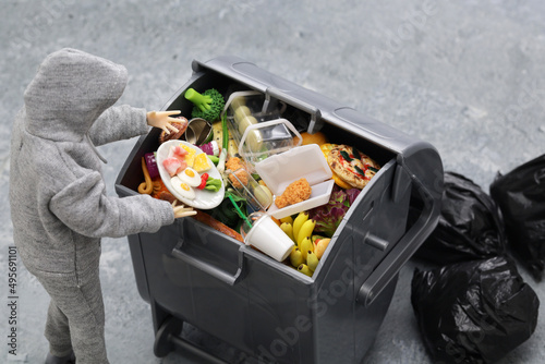 Fotografie don't waste food, world food day concept image made in miniature.