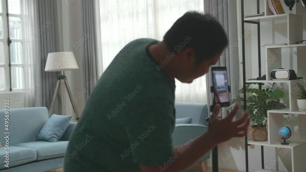 Asian Man Blogger Shoots Video Content For Social Networks By Smartphone Camera, Magician With Playing Cards
Asian Man Blogger Shoots Video Content For Social Networks By Smartphone Camera, Magician With Playing Cards