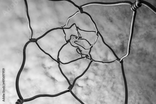 Photography artistic work depicting barbed wire installed in the gothic quarter in barcelona