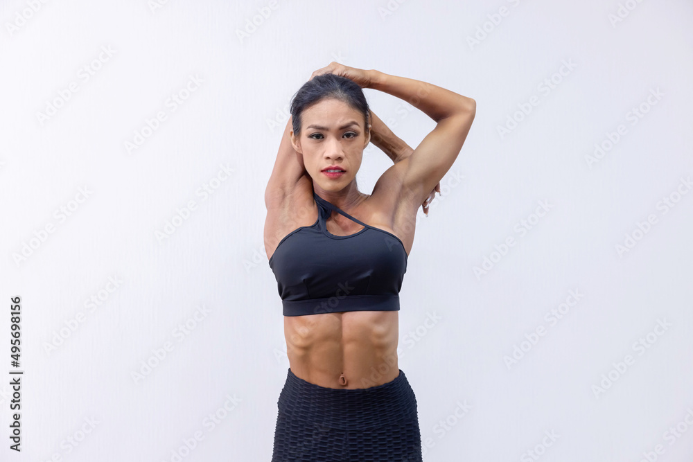Isolated Woman Warm Up by Stretching Her Back and Shoulder Muscle o Isolated Woman Warm Up by Stretching Her Back and Shoulder Muscle o