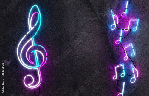 Fondo musical con notas musicales con luz de neon. Pared de cemento y cartel luminoso.Conciertos y eventos musicales.