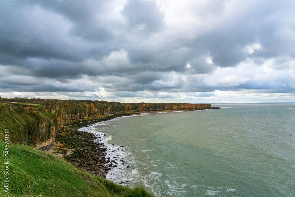 These cliffs at Pointe du Hoc on the Normandy coast near the town of Saint-Pierre-du-Mont had to be climbed by the Americans with rope ladders during the landing in 1944