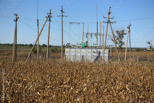 Transformers - electrical substation on an agricultural field.