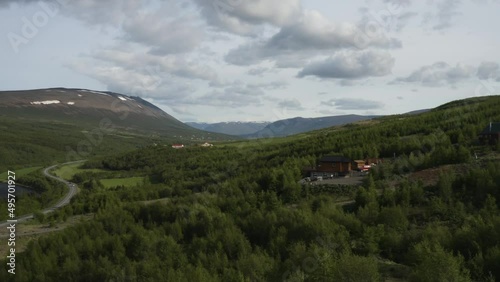 AERIAL - Beautiful woodland of Vaglaskogur Forest, Iceland, circle pan photo