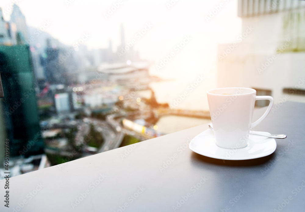 Coffee cup with blur city background