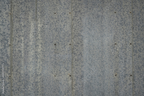 texture of a galvanized metal building wall for background