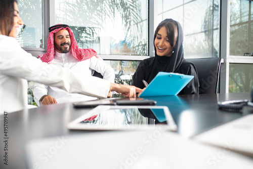 Multiethnic corporate business team meeting in the office for a strategic marketing plan - Office workers, entrepreneurs, and company employees at work in a multinational company
