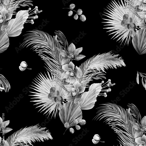 Watercolor seamless monochrome black and white pattern with a herbarium of dry palm leaves and orchid flowers on a black background in boho style for textile and surface design