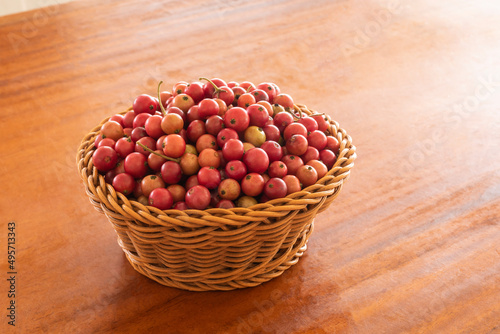 Calabura, Jam tree, Jamaican cherry fruit on wooden table