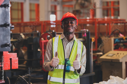 portrait African American worker in the factory.Engineer or technician  male black man photo