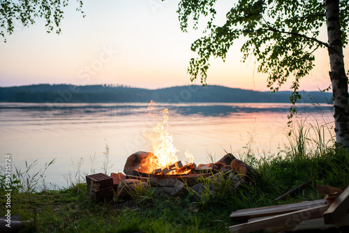 traditional finnish kokko - fire at midsummer photo