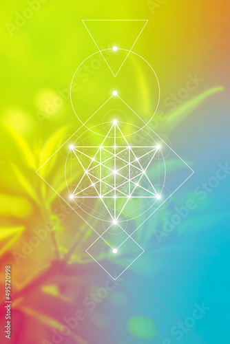 Merkaba sacred geometry spiritual new age futuristic illustration with interlocking circles, triangles and glowing particles in front of blurry natural photographic background