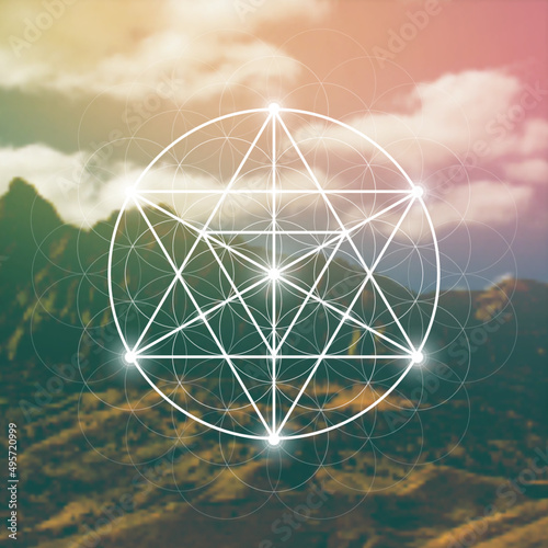 Merkaba sacred geometry spiritual new age futuristic illustration with interlocking circles, triangles and glowing particles in front of blurry natural photographic background