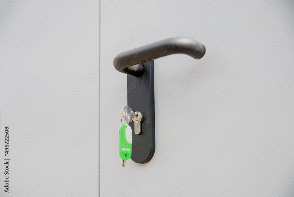 Door lock with keys macro shot - Real estate concept