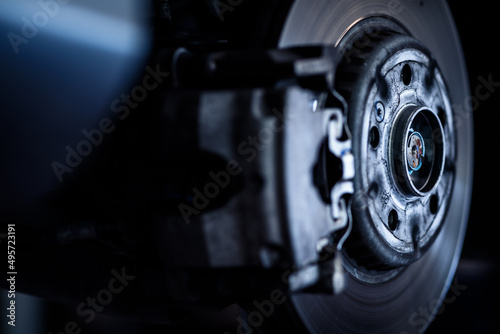 Tyre change - wheel balancing or repair and change car tire at auto service garage or workshop by mechanic © lightpoet