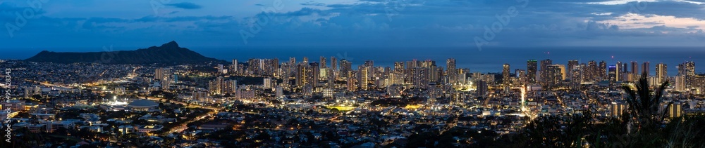 Honolulu skyline at blue hour with city lights