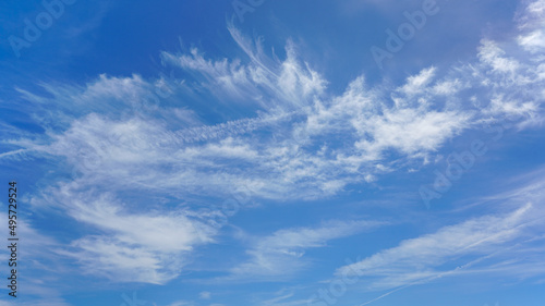WIspy clouds and blue sky suitable for background or sky replacement