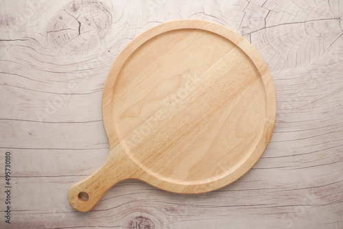wooden chopping board on a table top view 