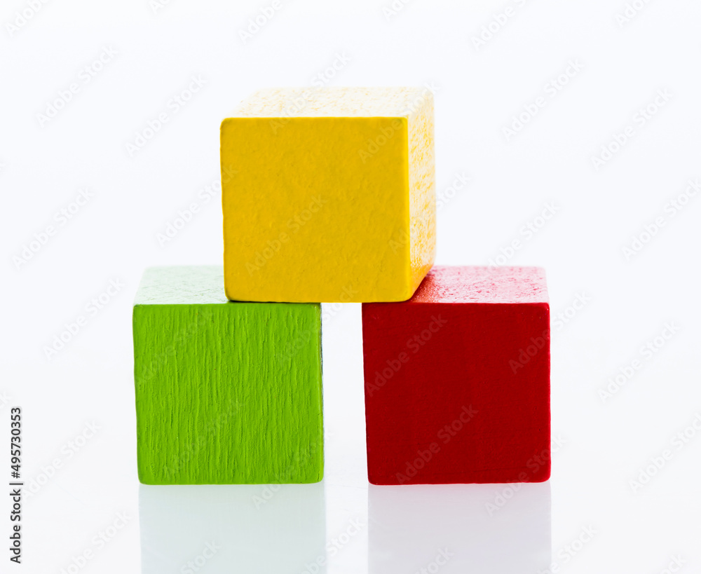 Three wooden blocks on white background Three wooden blocks on white background