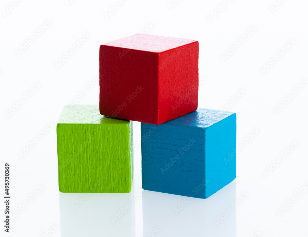 Three wooden blocks on white background