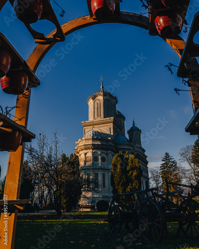 Vertical shot of the Cathedral of Curtea de Arges in Curtea de Arges, Romania photo