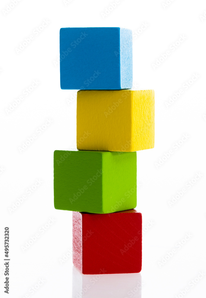 A stack of wooden blocks on white background A stack of wooden blocks on white background