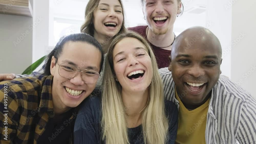 Group of different young people smiling at camera - Happy university students having fun together Group of different young people smiling at camera - Happy university students having fun together