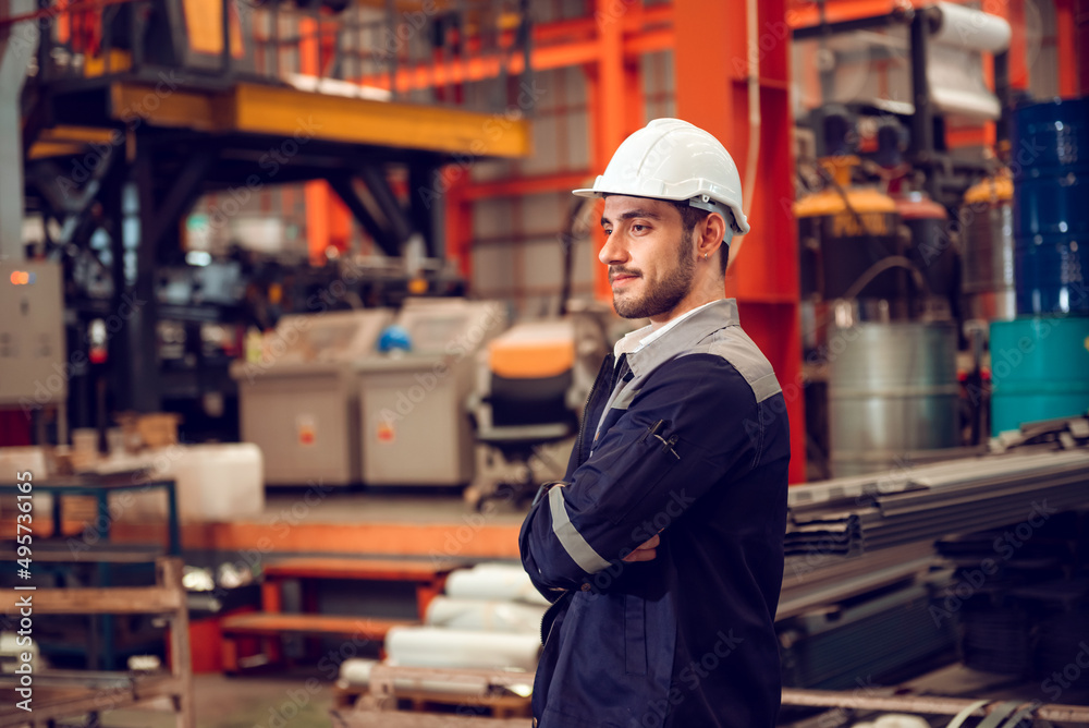 Smart factory worker engineering manager working at industrial worksite , wearing hard hat for safety. Smart factory worker engineering manager working at industrial worksite , wearing hard hat for safety.