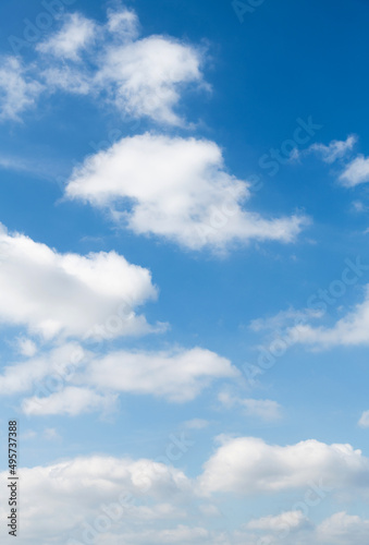 Blue sky with white clouds background © xy