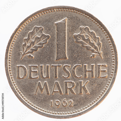 Germany - circa 1962: a 1 DM coin of Germany the symbol of the economic miracle and the text Federal Republic of Germany. 1 German mark.