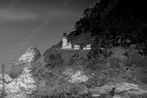 Grayscale shot of the Heceta Head Lighthouse on the Oregon Coast photo