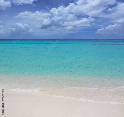 Travel background with clouds sky and Caribbean sea. © Swetlana Wall