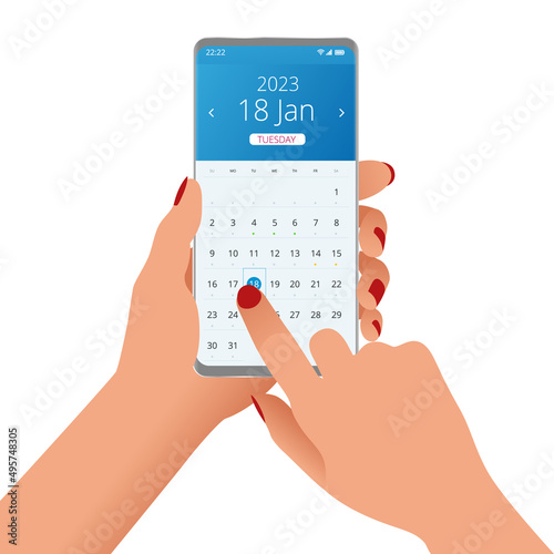 2023 calendar on application. Woman holding with smartphone 2023 calendar app