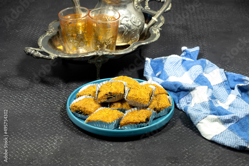 Fried Makrout - Algerian semolina, dates and honey sweets, traditional North Africa sweet food for islam holidays like Ramadan and Eid photo