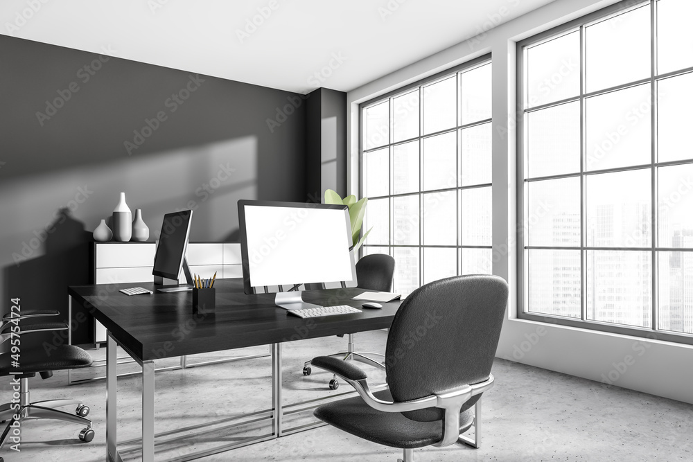 Business interior with pc desktop, table, panoramic window and mockup display Business interior with pc desktop, table, panoramic window and mockup display
