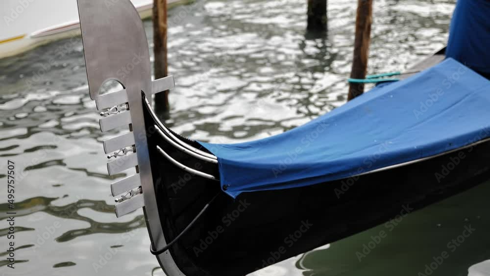 Venice, Italy - gondolas and gondoliers in the Grand Canal near the Rialto Bridge, in the San Marco Basin and between the canals of the lagoon city Venice, Italy - gondolas and gondoliers in the Grand Canal near the Rialto Bridge, in the San Marco Basin and between the canals of the lagoon city