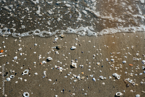  beautiful photo of the sea surf close-up, top view. wave crashes on a rocky seashore