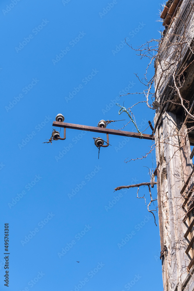old electrical insulators in abandoned ruined building old electrical insulators in abandoned ruined building