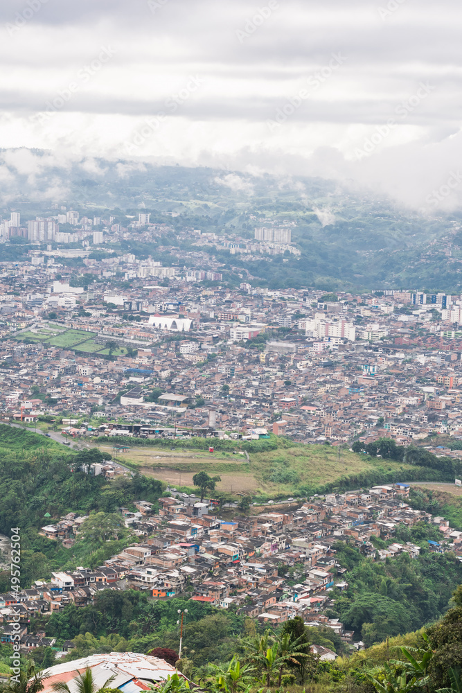 view of the city of Pereira-Colombia from the top of the mountain. urban area bordering the municipality of dosquebradas and pereira in view of the neighborhood of las vegas.