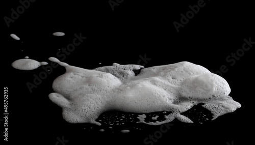 Soap foam  lather isolated on black  with clipping path  texture and background