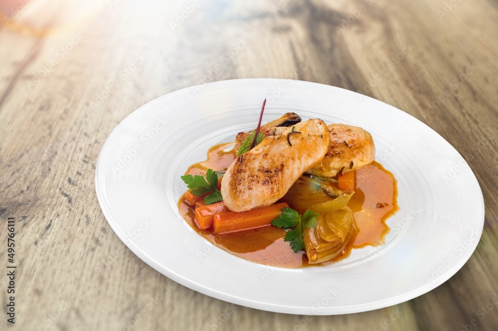 Roast chicken meat with vegetable on plate Roast chicken meat with vegetable on plate