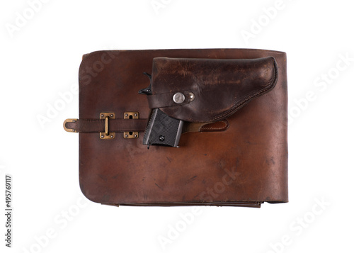 pistol and leather tablet of a soldier from the second world war.