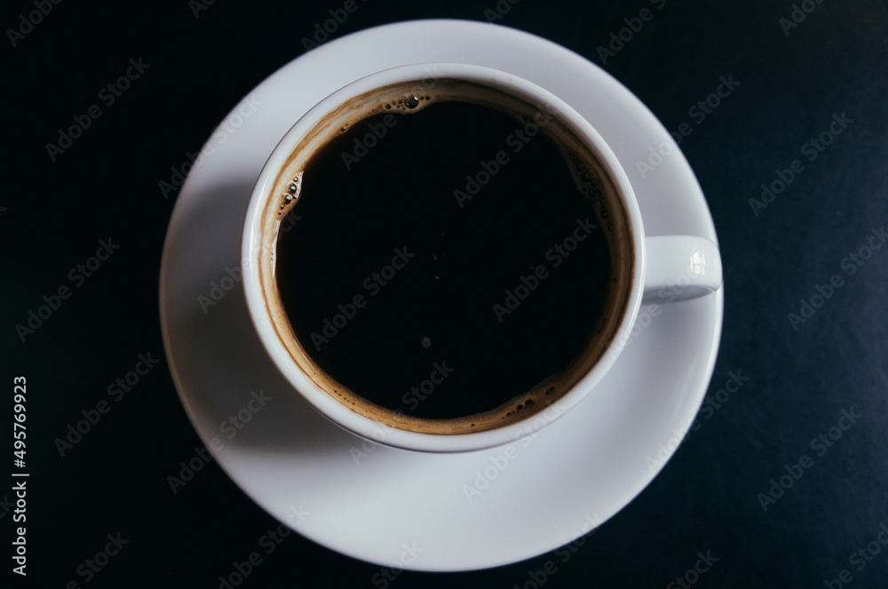 coffee americano in mug, top view, coffee in white mug, selective focus coffee americano in mug, top view, coffee in white mug, selective focus