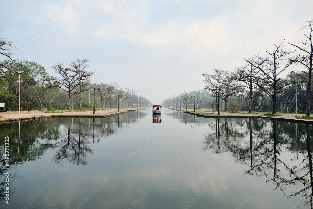 Fototapeta premium Boat arriving to Lumbini, Nepal; the birthplace of Siddhartha Gautama (Buddha)